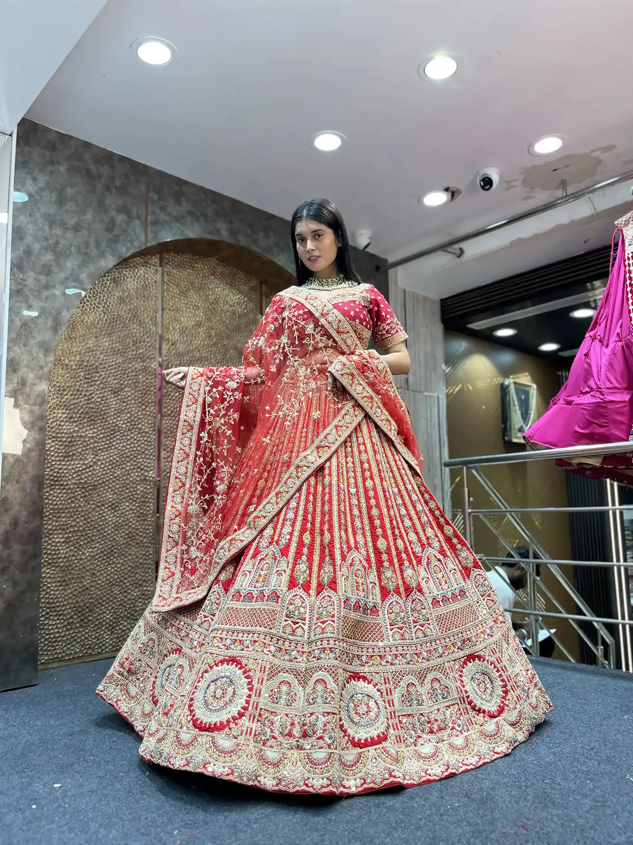 Bright red raw silk lehenga with fusion work